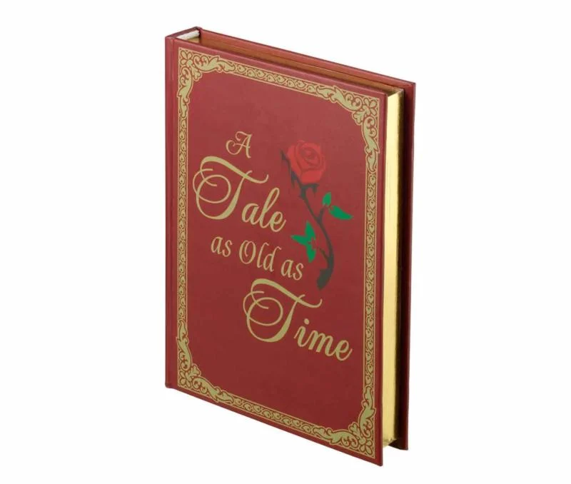 fairy-tale-storybook-ringdoosje-a-tale-as-old-as-time Rood Fairy Tale Storybook ringdoosje met gouden opdruk "A Tale as Old as Time" en een roos