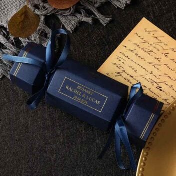 Elegante blauwe toffee-vormige geschenkdoosjes met gouden randafwerking