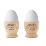 Set van gepersonaliseerde houten eierdopjes met gegraveerde decoratie