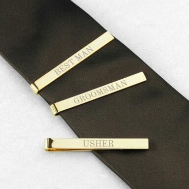 Drie gouden dasspelden met Best Man, Groomsman en Usher gravering