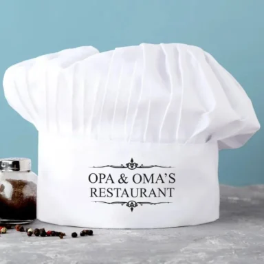 Koksmuts met de naam [Naam] en 'Restaurant' geprint
