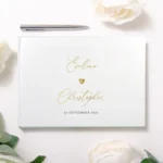 Wit bruiloft gastenboek met gouden namen en datum