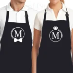 Zwarte His & Hers kookschorten set met gepersonaliseerde namen en monogram