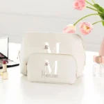 Gepersonaliseerde make-up tas en toilettas set met elegant boho monogram uit de Oester Collectie