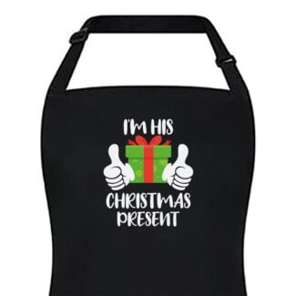 Zwart keukenschort bedrukt met "I'm His Christmas Present"