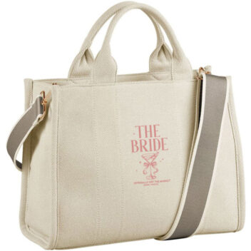 Blush Bride Tote, blush pink stijlvolle bruidstas met 'The Bride' en martini design, perfect als cadeau voor de bruid of voor de bruiloftsdag.