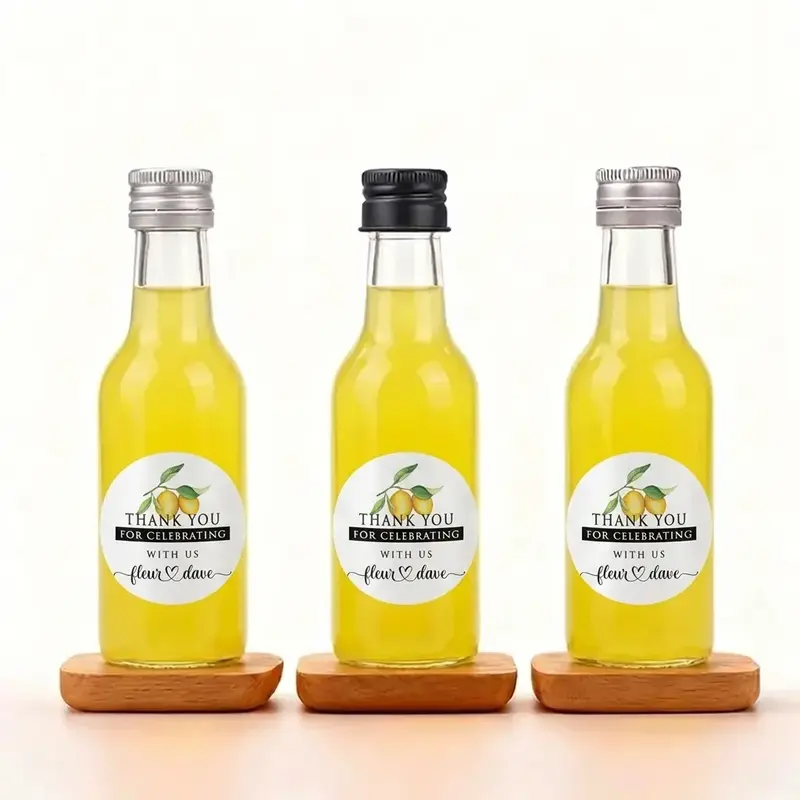 limoncello-bedankje-bruiloft-vinyl-etiket Limoncello bedankje bruiloft met vinyl etiket gepersonaliseerd met naam en datum