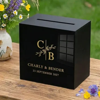 Enveloppendoos acryl botanisch monogram zwart met gouden bedrukking gepersonaliseerd met initialen namen en datum