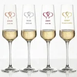 Champagneglazen jubileum met hartendesign in koper zilver robijn en goud gepersonaliseerd